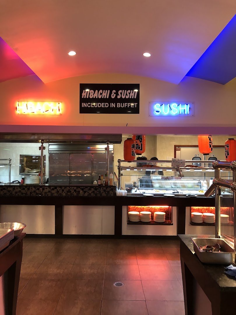 Buffet tables with assorted Asian dishes